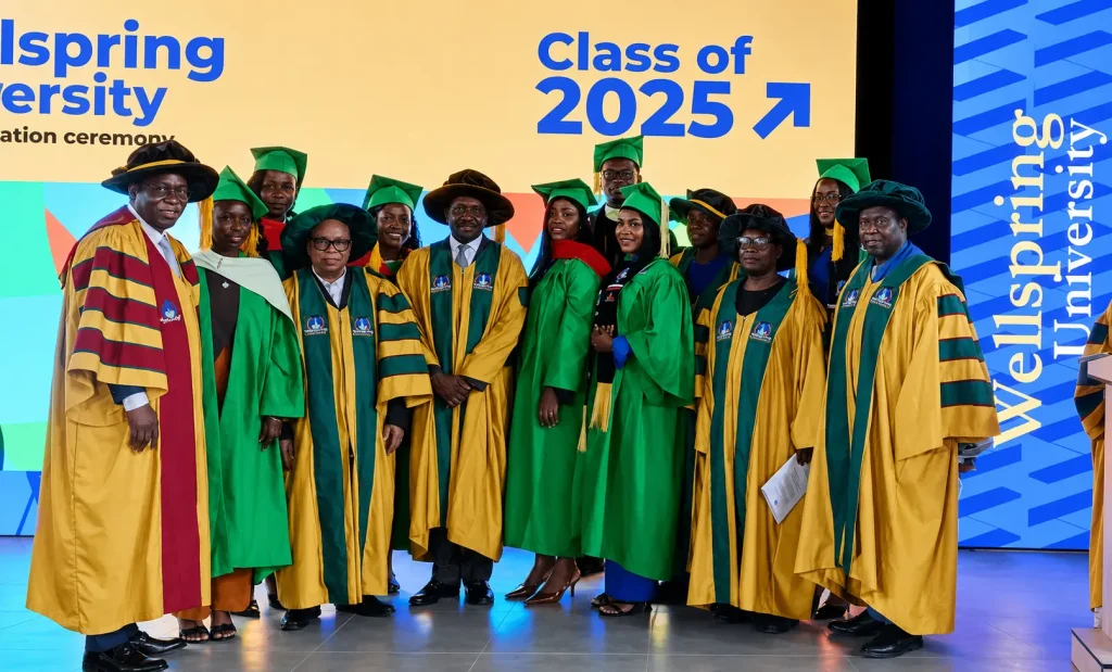 Wellspring University Class of 2025 graduands and faculty in academic regalia at the convocation ceremony